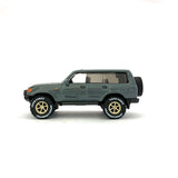 1/64 wheels with easy installation, toyota landcruiser 80 on monoblock SS design in top secret gold, with Toyo open country off-road tires.