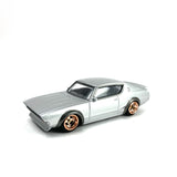 1/64 wheels with easy installation, Aoshima Nissan Skyline Kenmeri on CS design in diamond cut rose gold, with stretch tires.